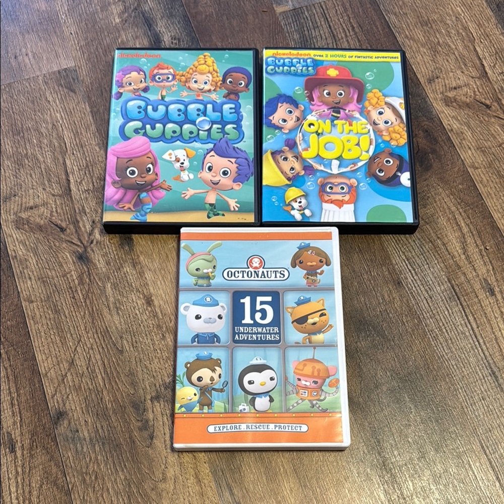 Guess DVD Collection with Gray and Orange Discs
